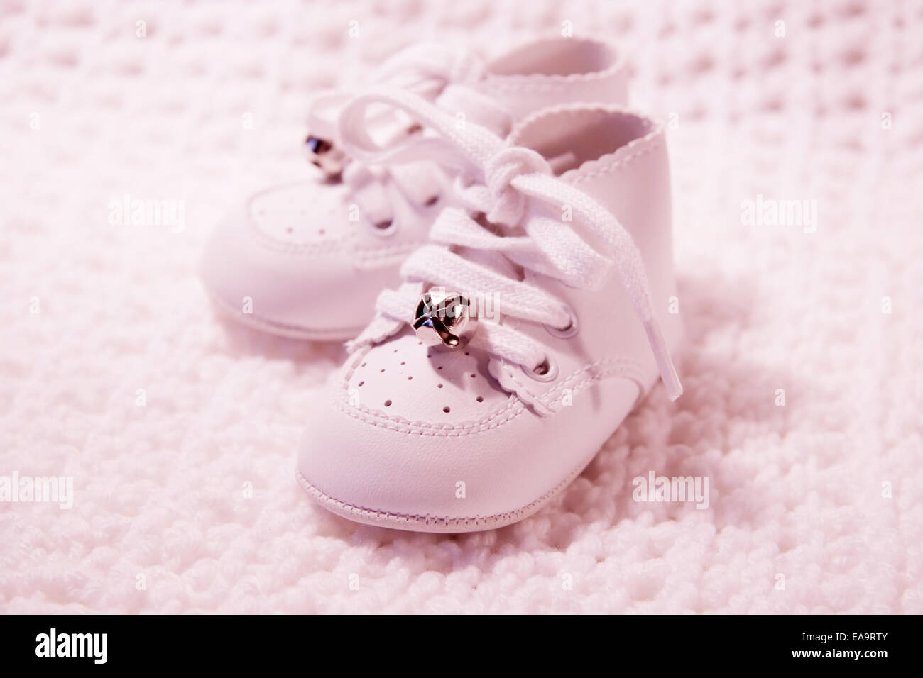 Pair of Babies first shoes with pink tint Stock Photo Alamy