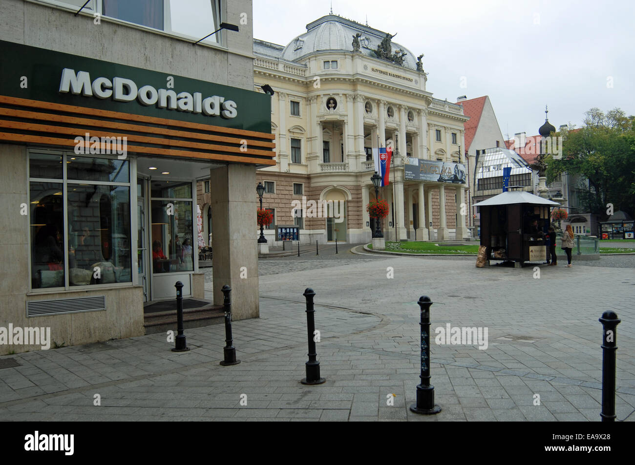 McDonald's restaurant in old town of Bratislava, next door to The Slovak National Theatre. Stock Photo