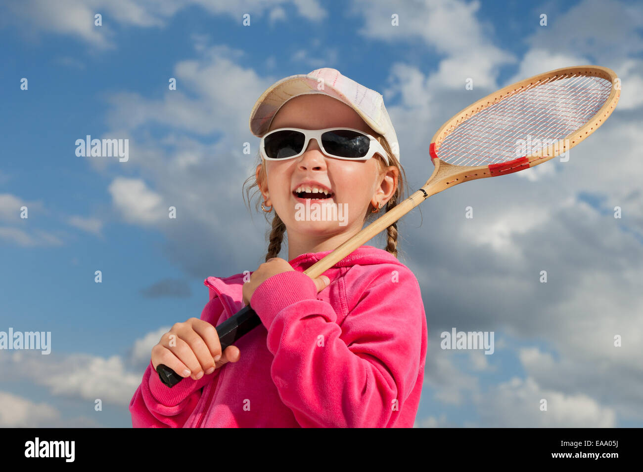 little girl with racket for badminton Stock Photo