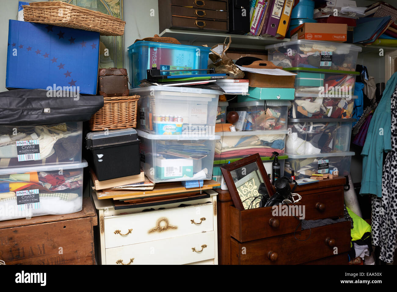 Bedroom filled with clutter Stock Photo - Alamy