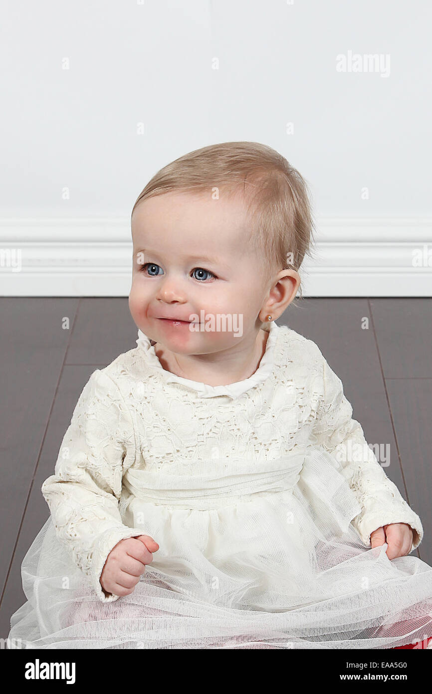 Adorable little girl isolated on white background Stock Photo - Alamy