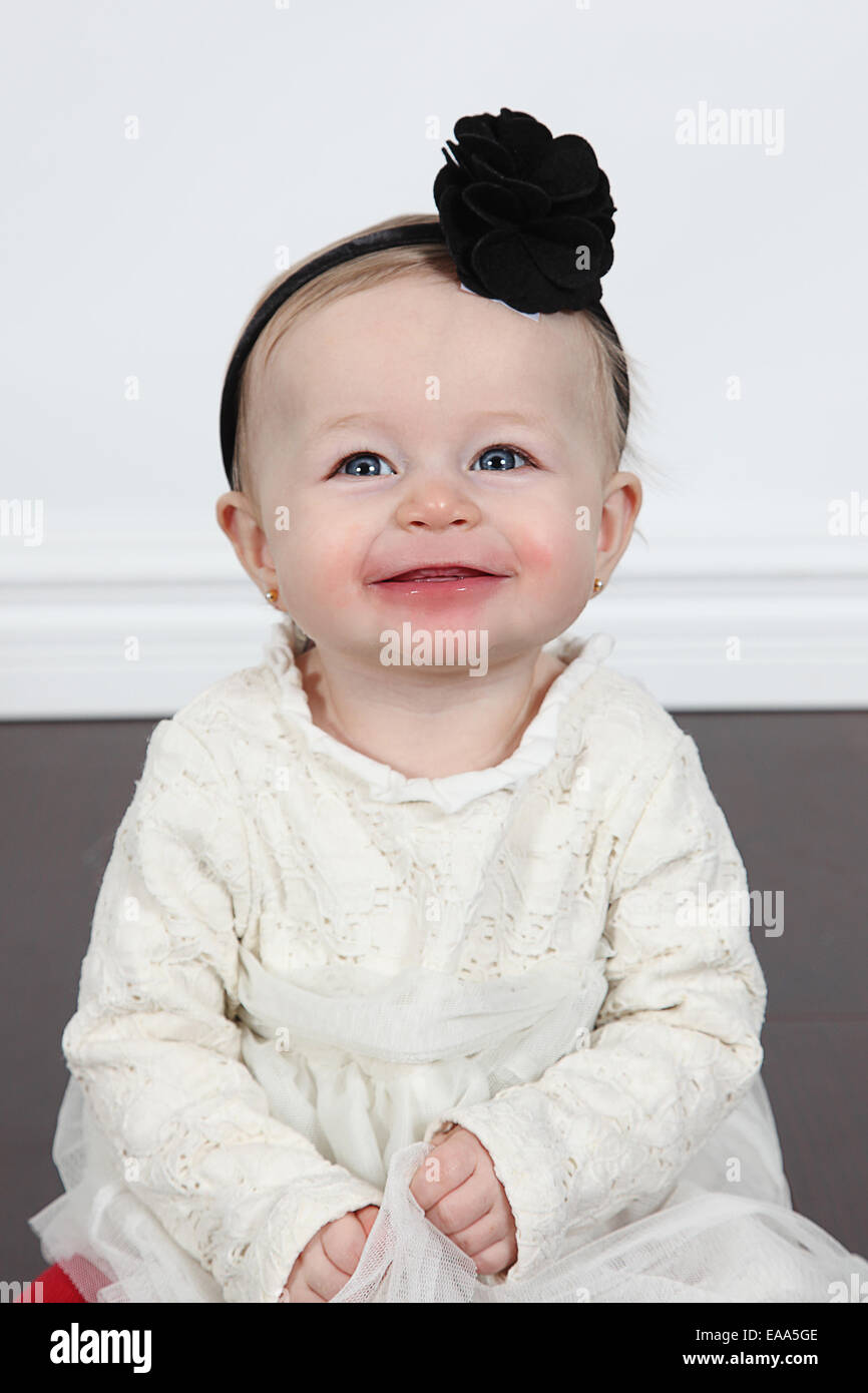 Adorable little girl isolated on white background Stock Photo - Alamy