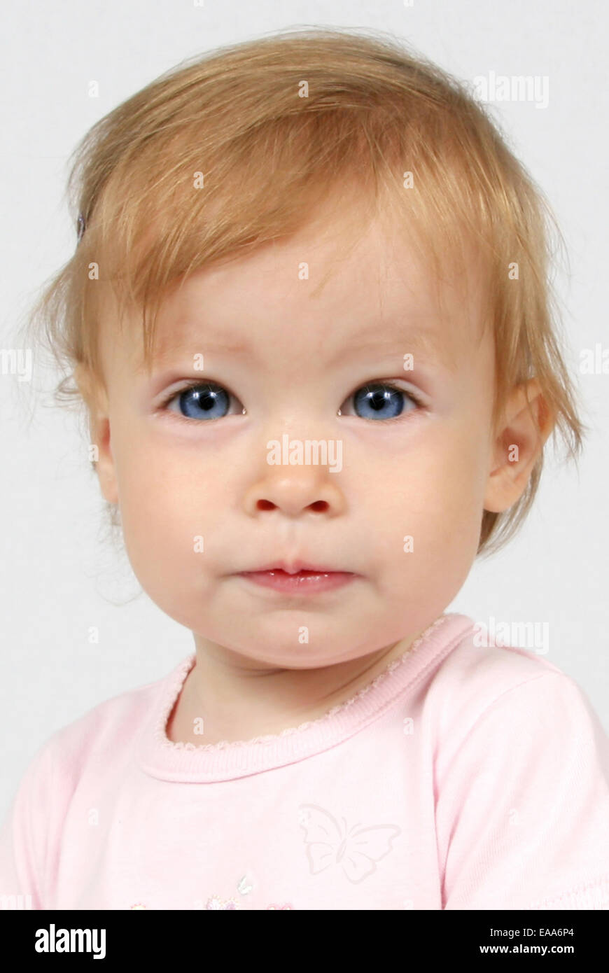 Little Baby Girl in pink dress taken closeup Stock Photo - Alamy