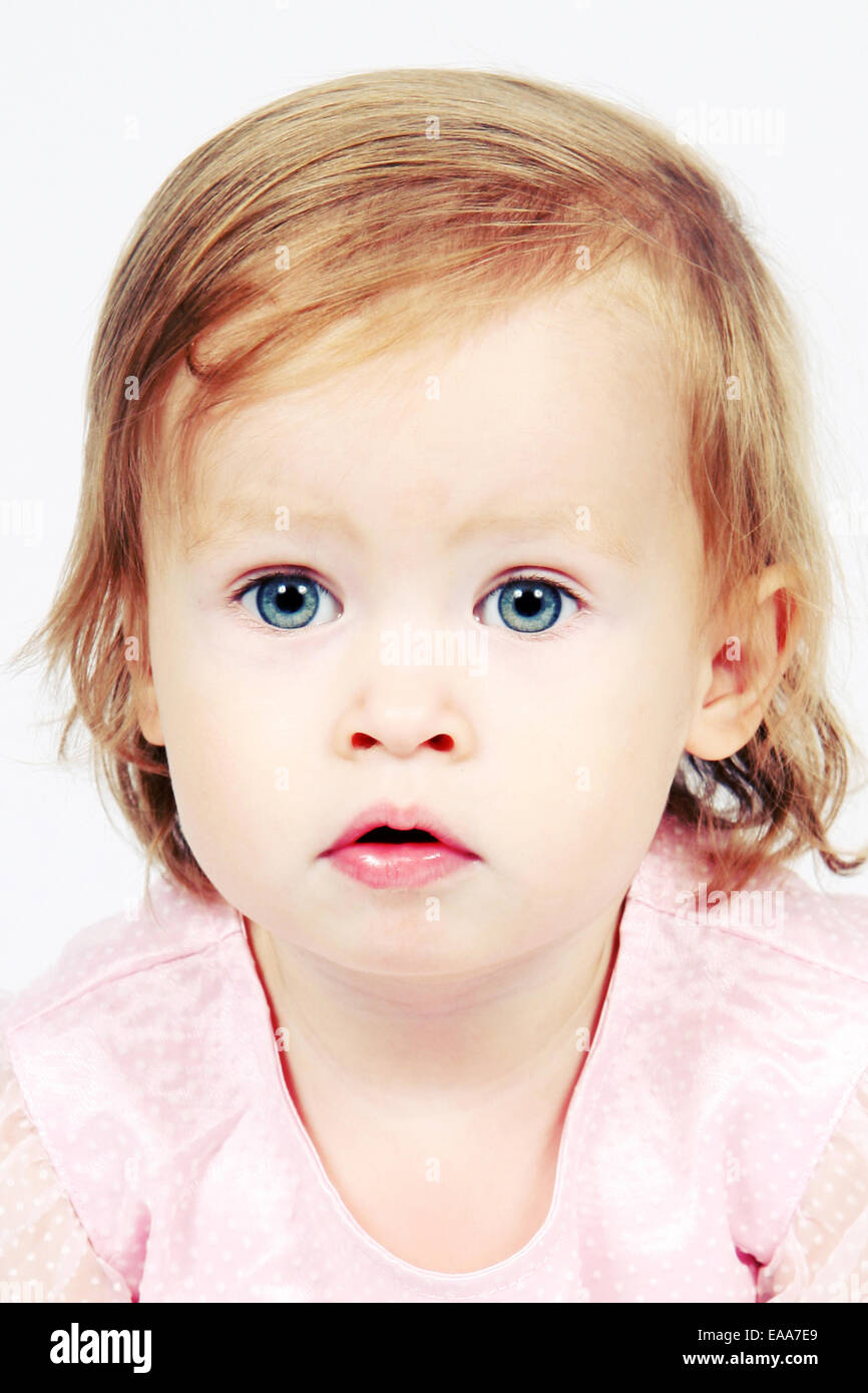 Little Baby Girl in pink dress and white background Stock Photo - Alamy