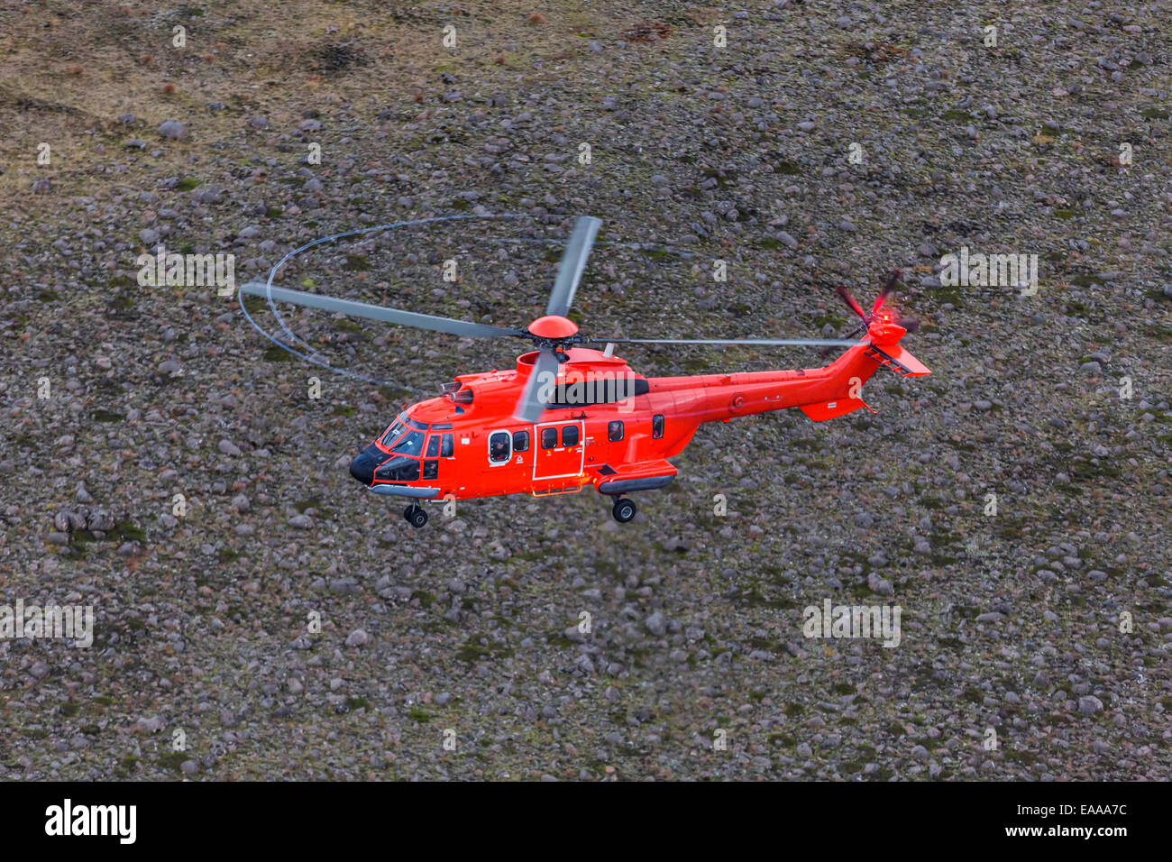 TF-SYN, Search and Rescue Helicopter flying by Gullfoss Waterfalls, Iceland Stock Photo