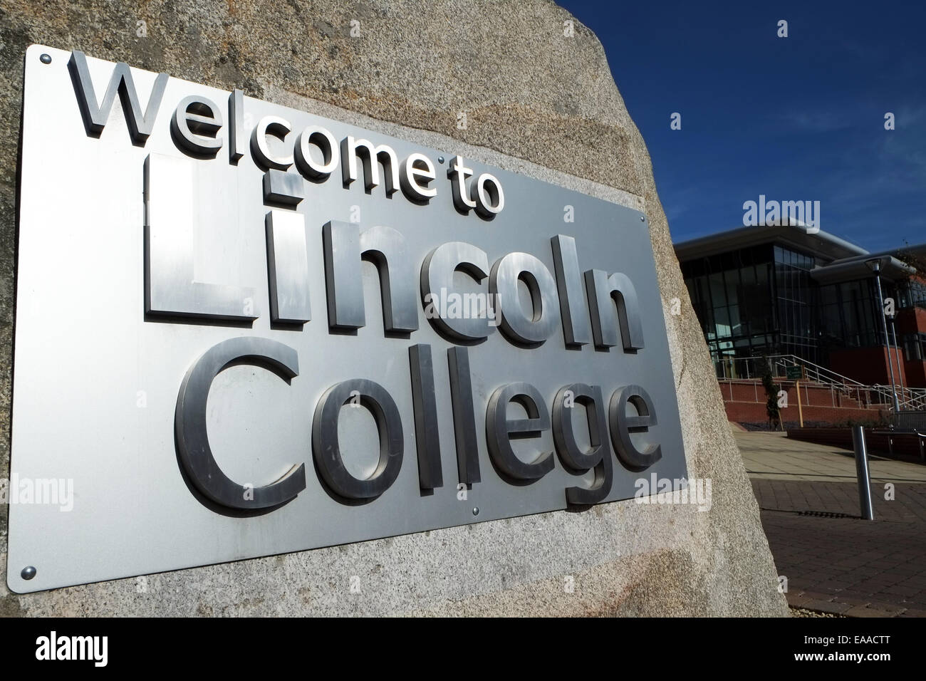 Lincoln college welcome sign City Lincolnshire education learning building exterior facade Monks Road Stock Photo