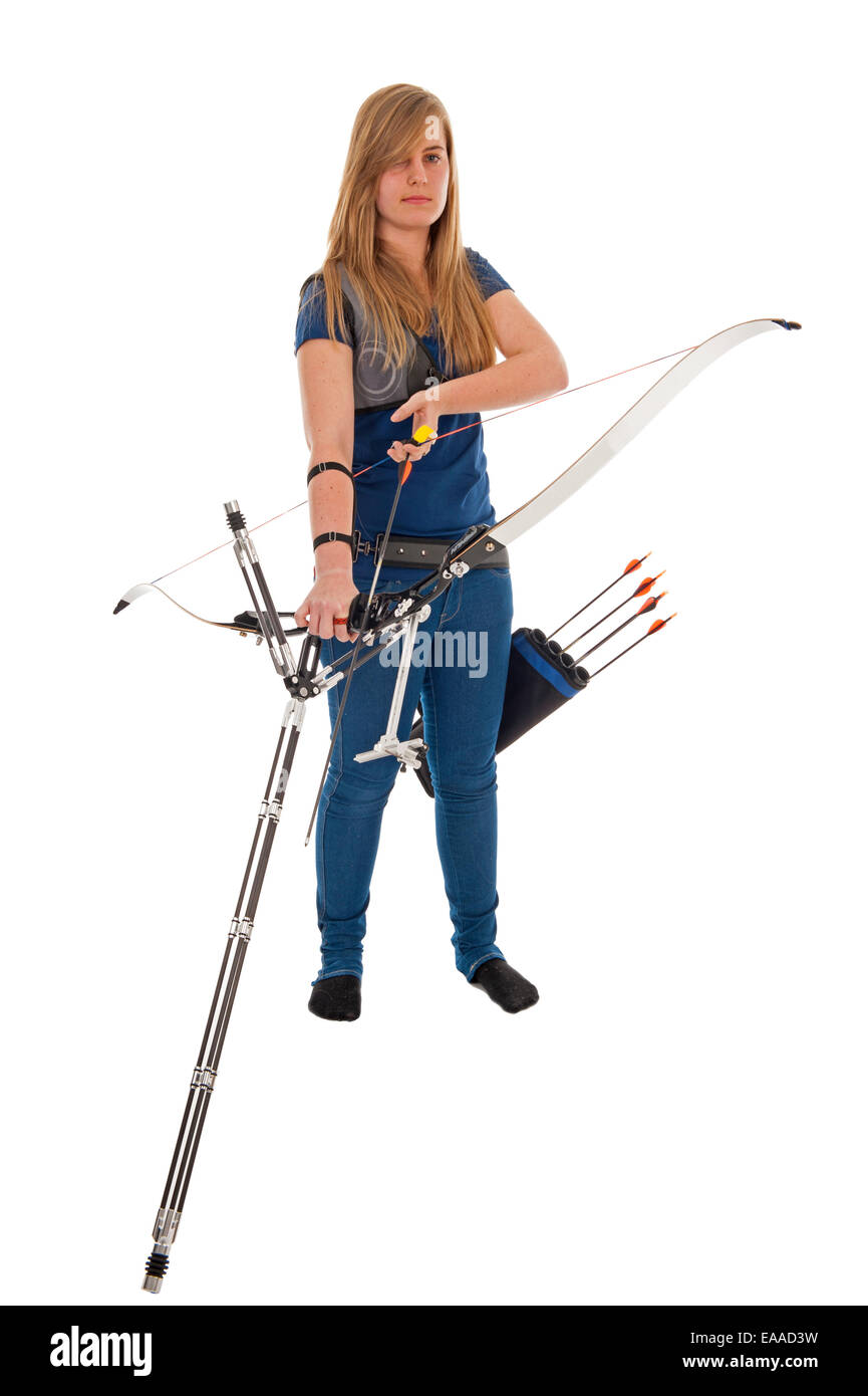 Young girl with blue shirt and jeans holding a longbow isolated in white Stock Photo