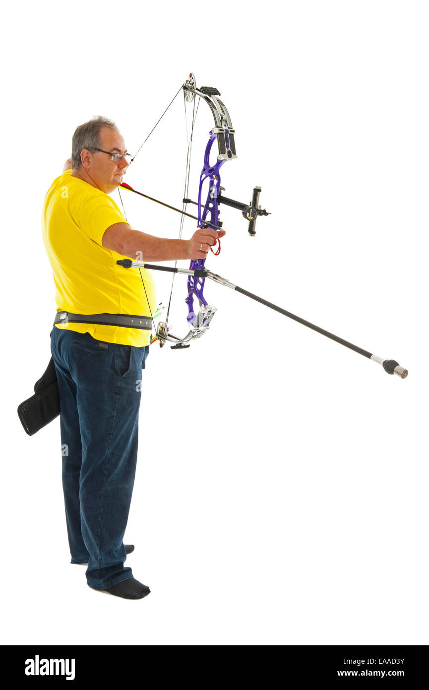 Man with yellow shirt and jeans shooting with a longbow isolated in white Stock Photo