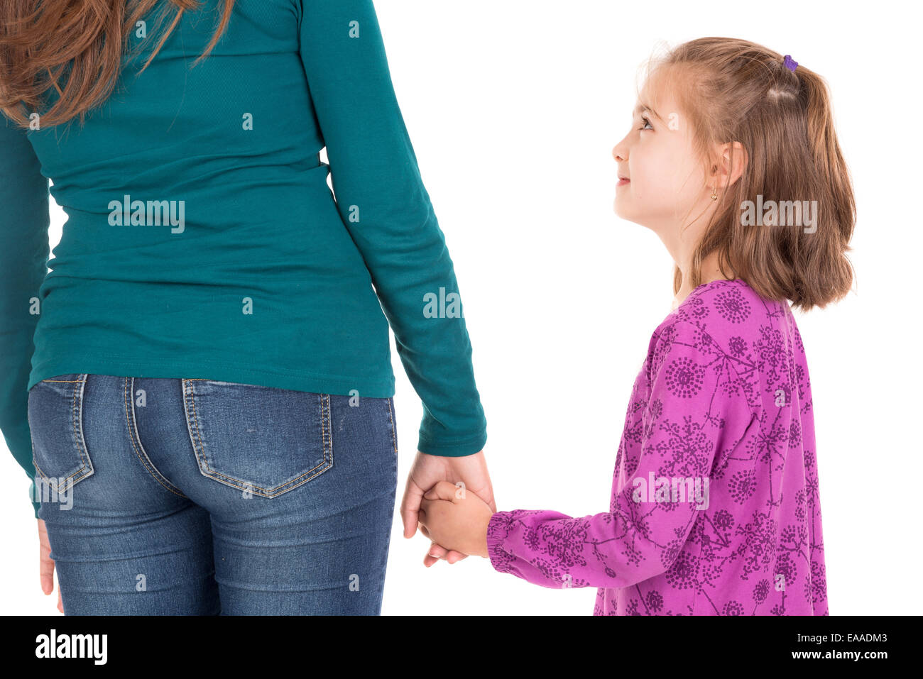 Young girl holding her mother's hand isolated in white Stock Photo