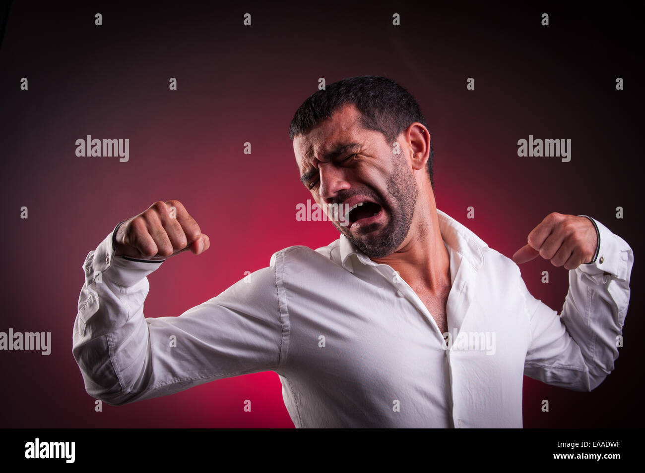 man stretching or being lazy Stock Photo