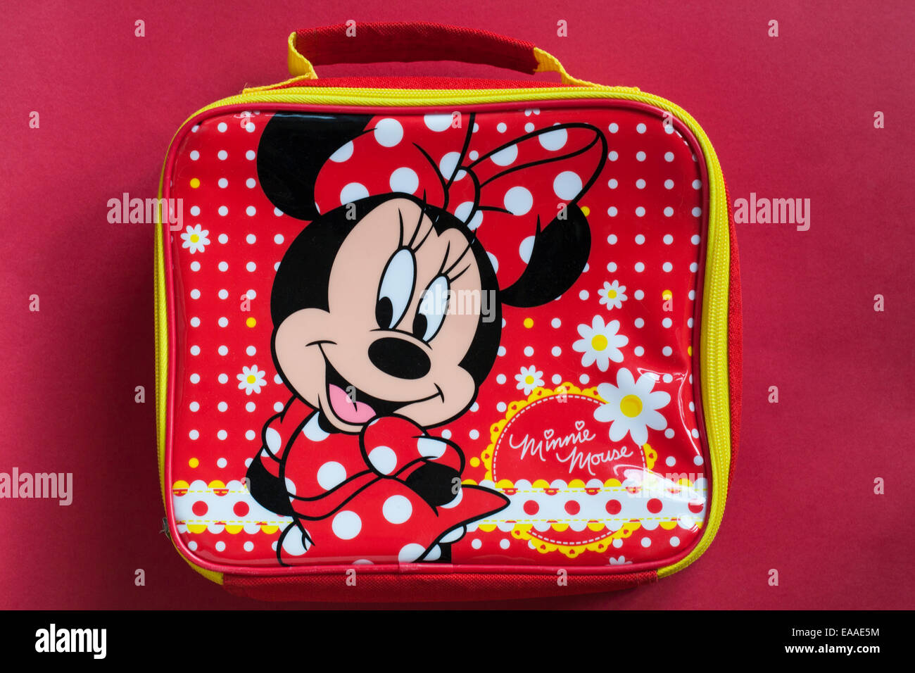 Minnie Mouse child's bag lunch box set on red background Stock Photo