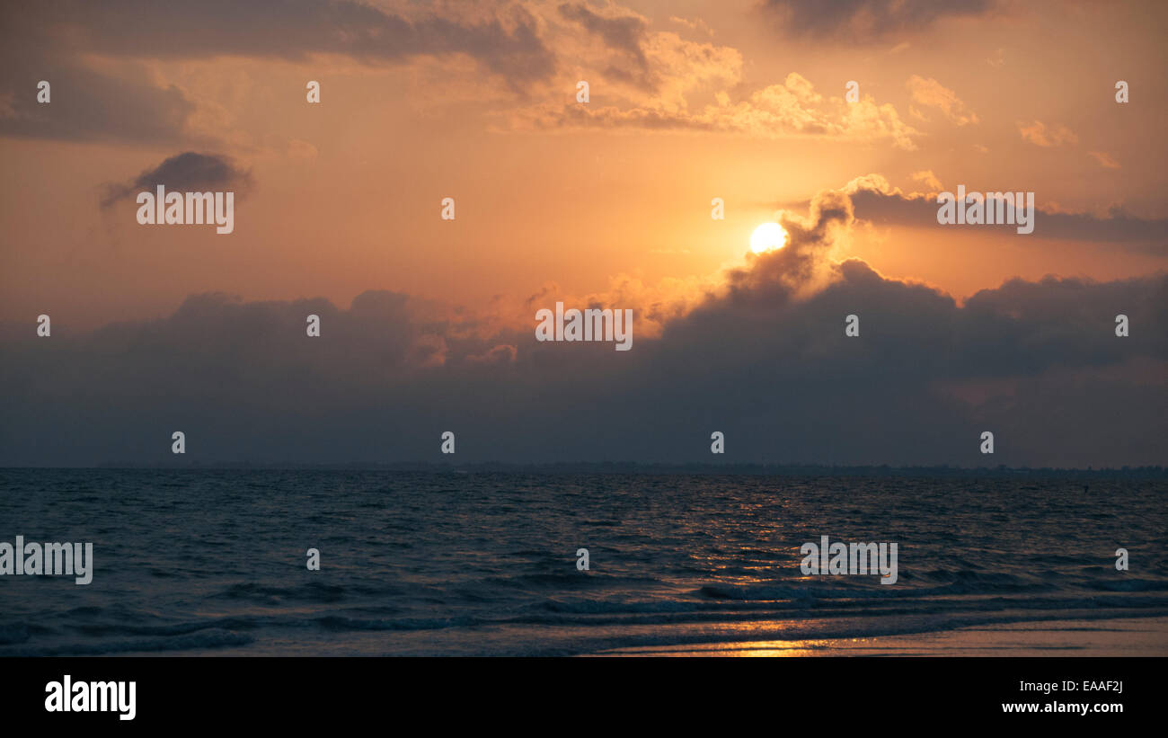 sunset [warm light] seascape beach cloud Florida Stock Photo