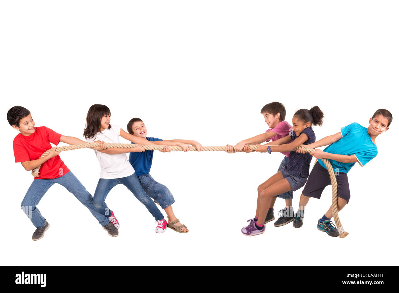 Group of children in a ropepulling contest Stock Photo Alamy