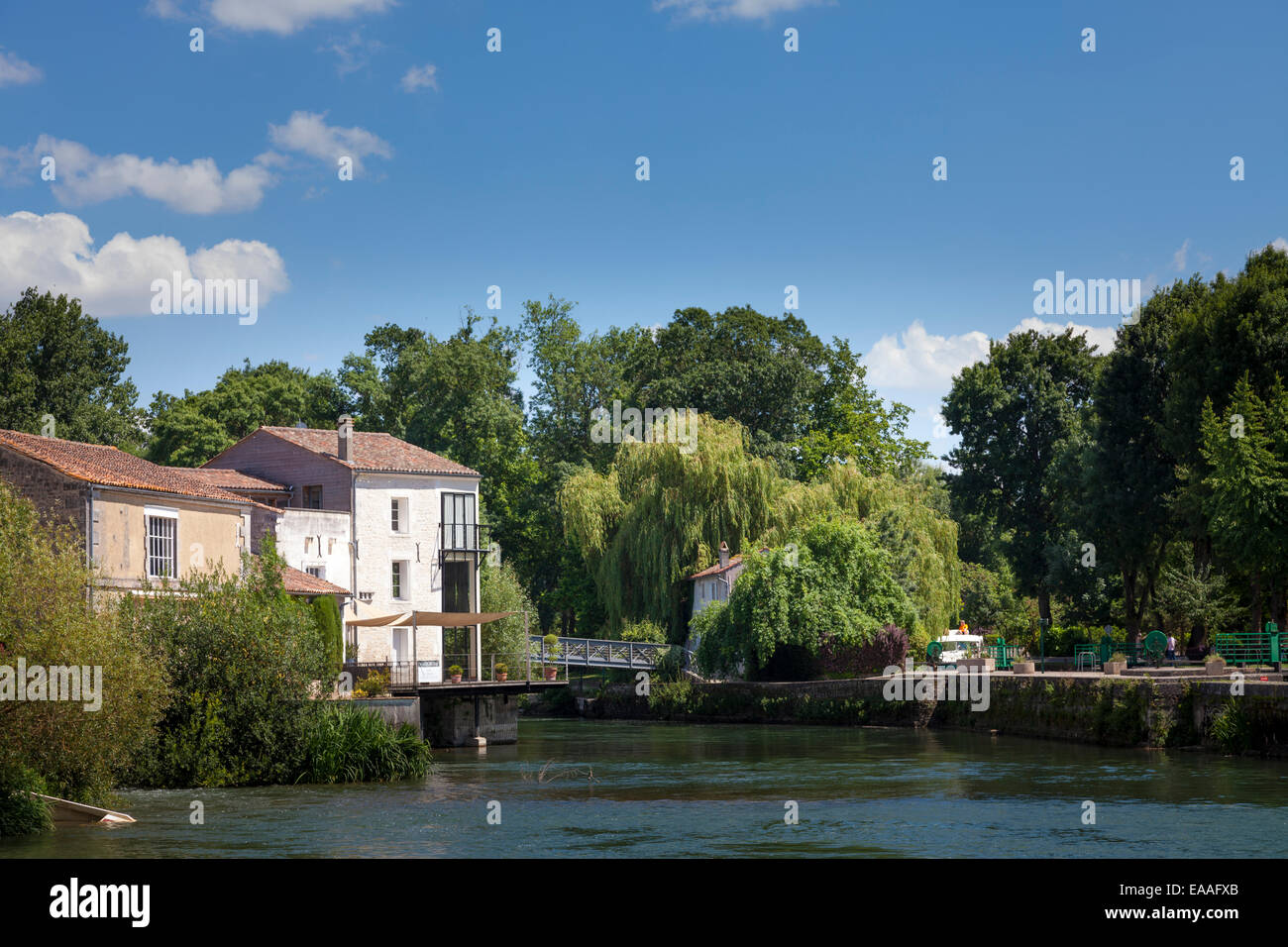 Houses on the river Charente at Jarnac Stock Photo Alamy