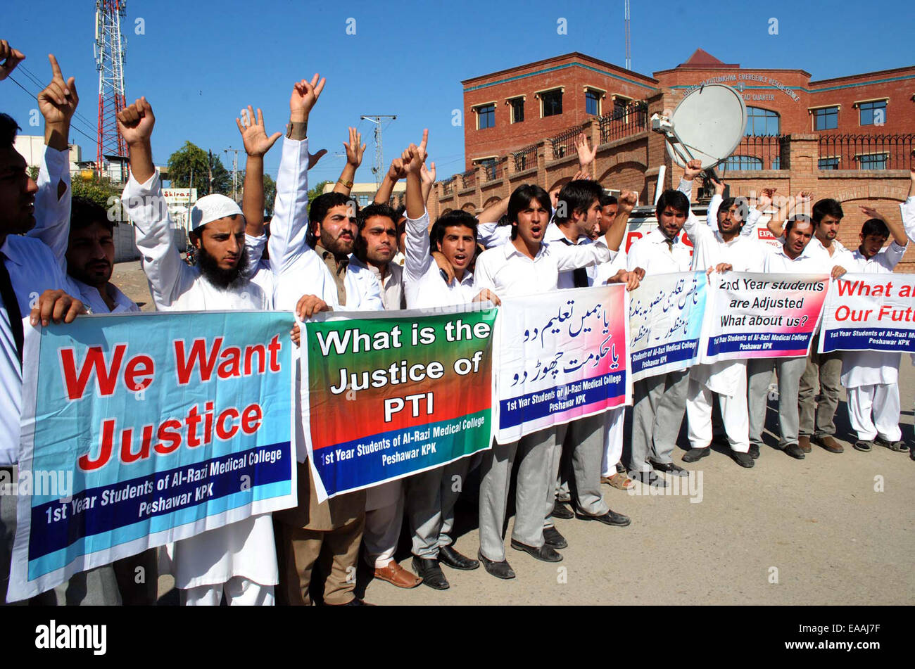Students of Al-Razi Medical College chant slogans against high handedness of their college administration during protest demonstration at Peshawar press club on Monday, November 10, 2014. Stock Photo