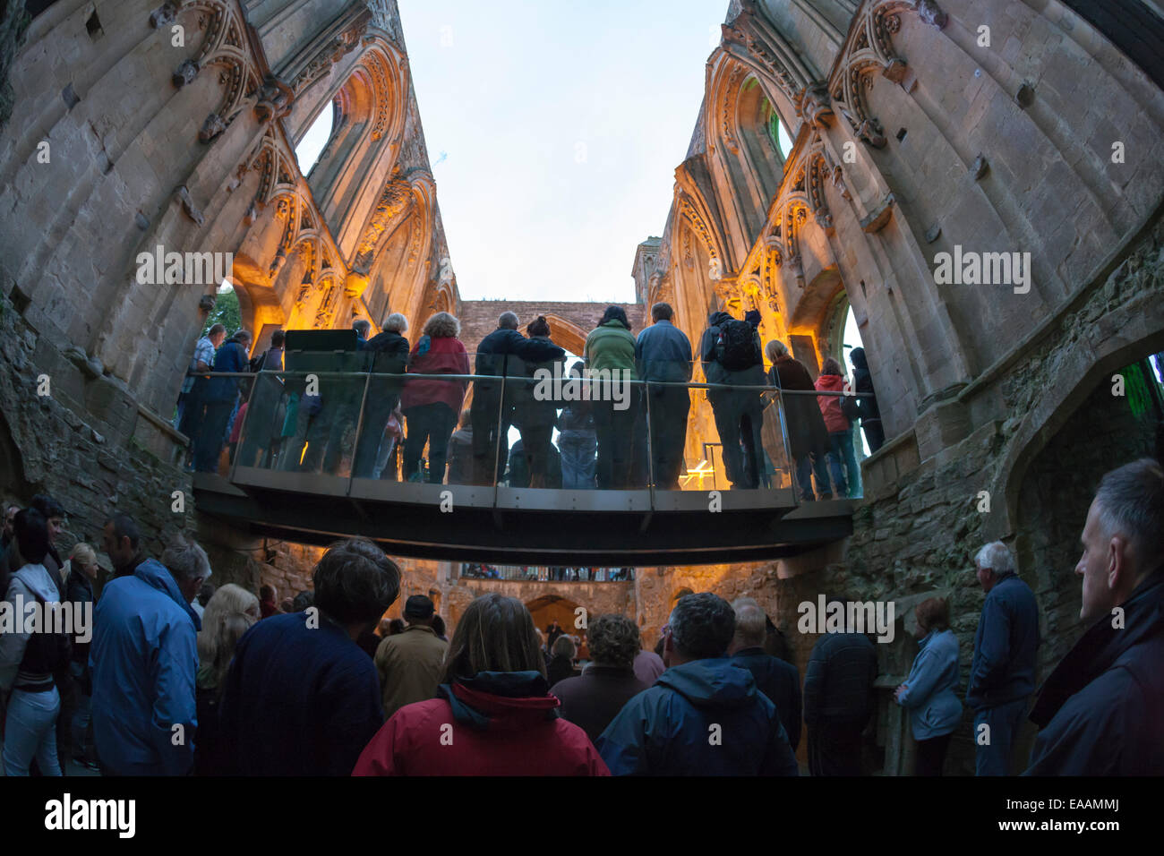 Concert audience inside the ruins of Glastonbury Abbey, Somerset Stock Photo