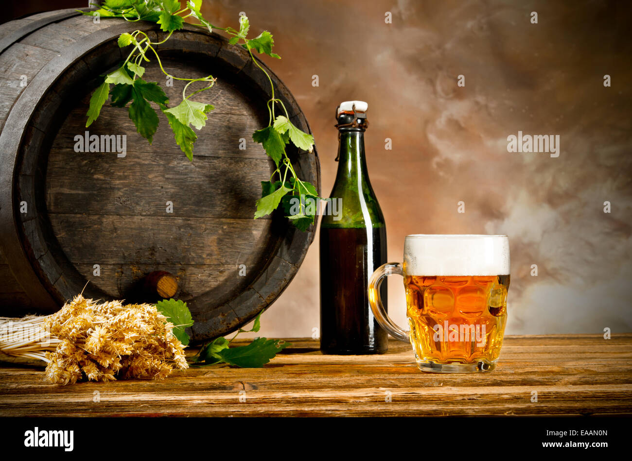 Beer keg with glass of beer and blur background Stock Photo