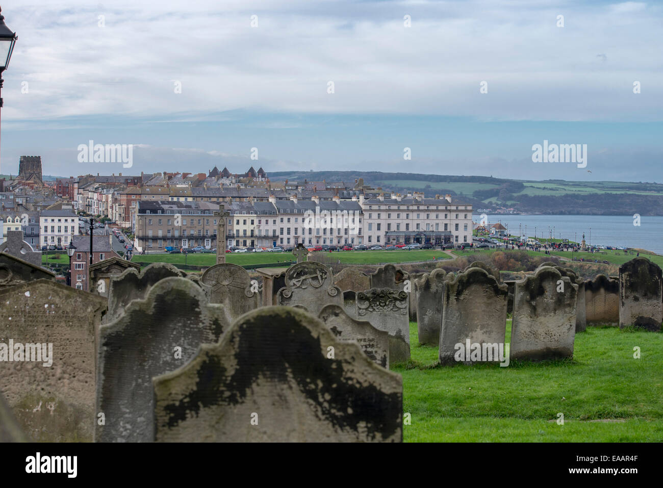View of Whitby, North Yorkshire, England from  a graveyard at the cliff top Whitby Abbey Stock Photo