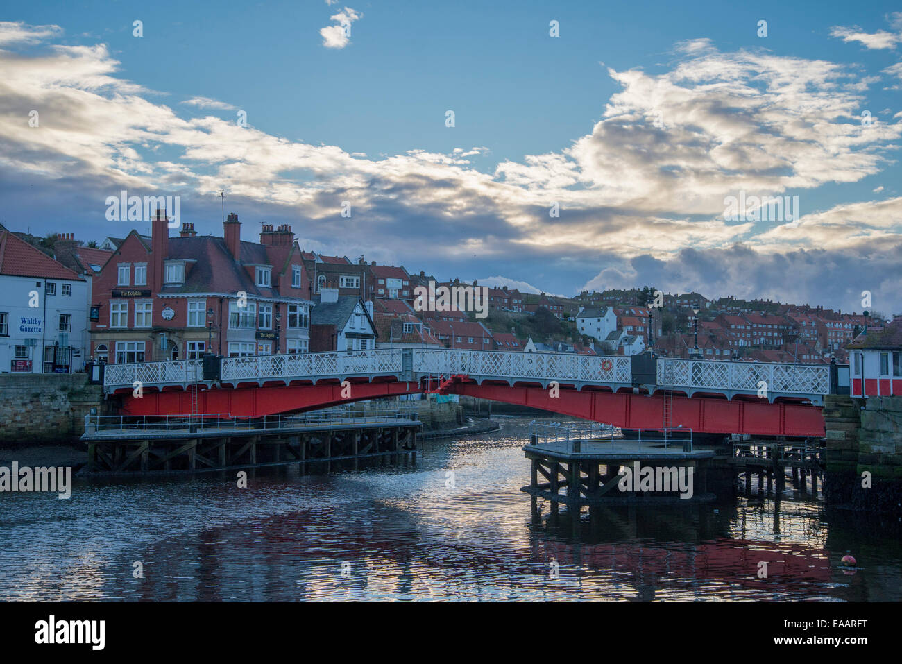 View of the swing bridge over the river Esk in Whitby, North Yorkshire, England, UK in early morning light. November 2014 Stock Photo
