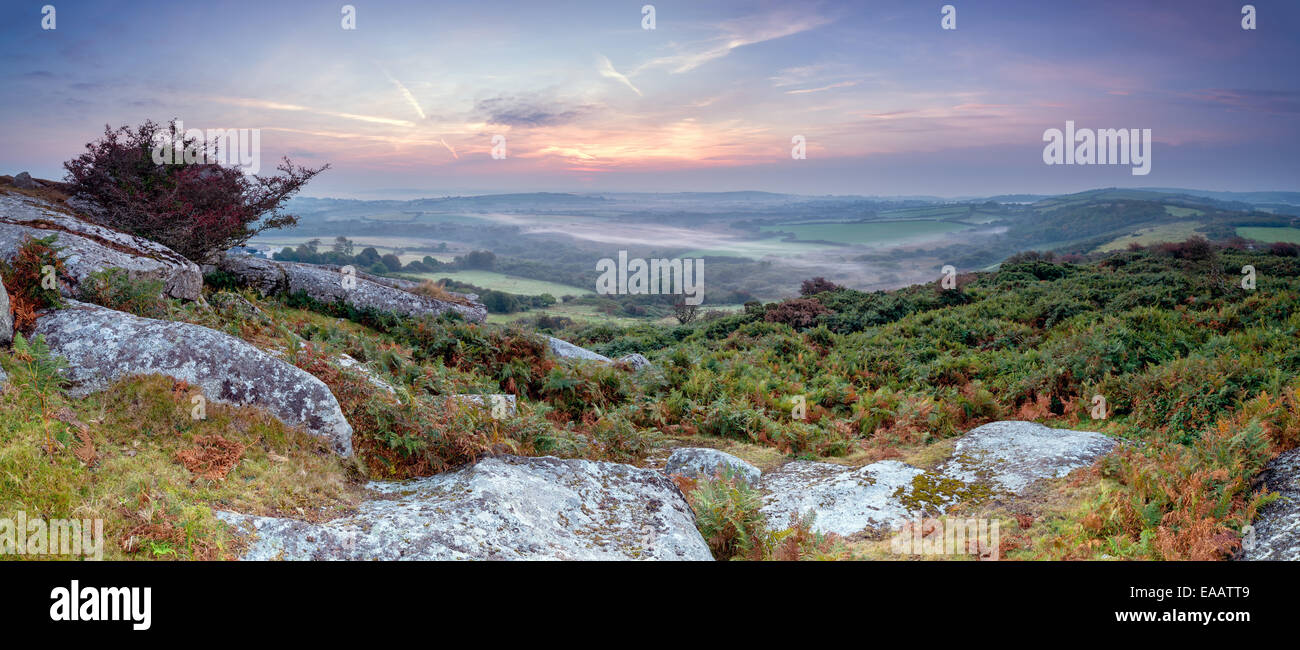 Beautiful misty sunrise over the Cornwall countryside from helman Tor near Bodmin Stock Photo