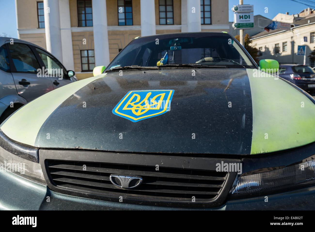 Car with Ukrainian Coat of arms on Kontraktova Square in Kiev, Ukraine Stock Photo