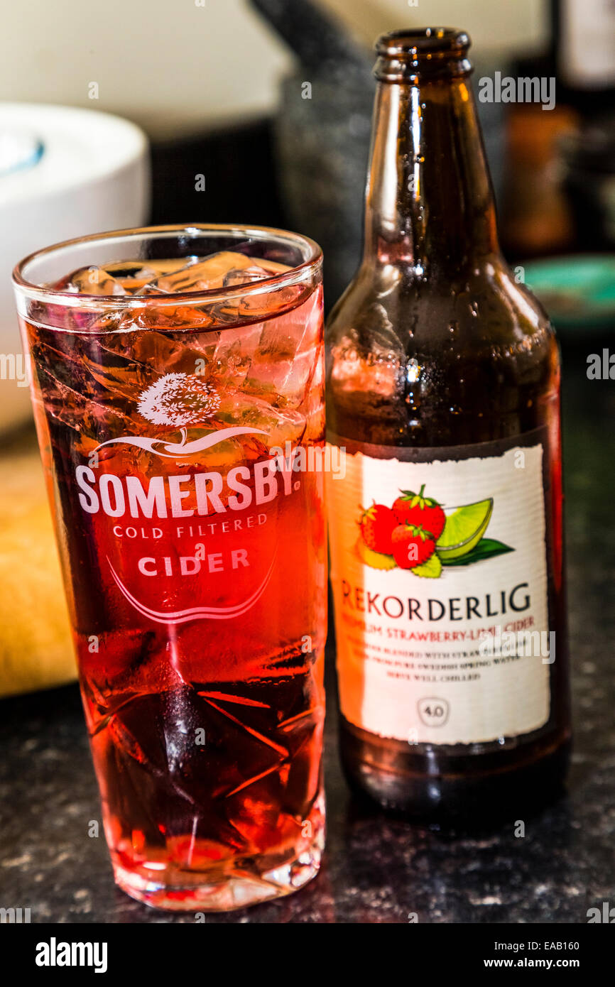 A Somersby cider glass filled with Rekorderlig Strawberry & Lime cider Stock Photo