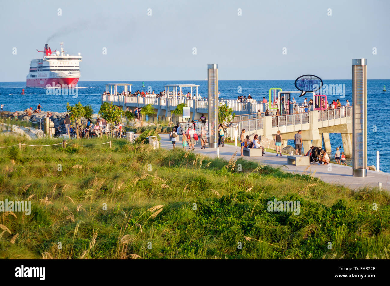Miami Beach Florida,South Pointe Park Pier,Atlantic Ocean,water,dune grass,natural,turtle light towers,FL140823042 Stock Photo
