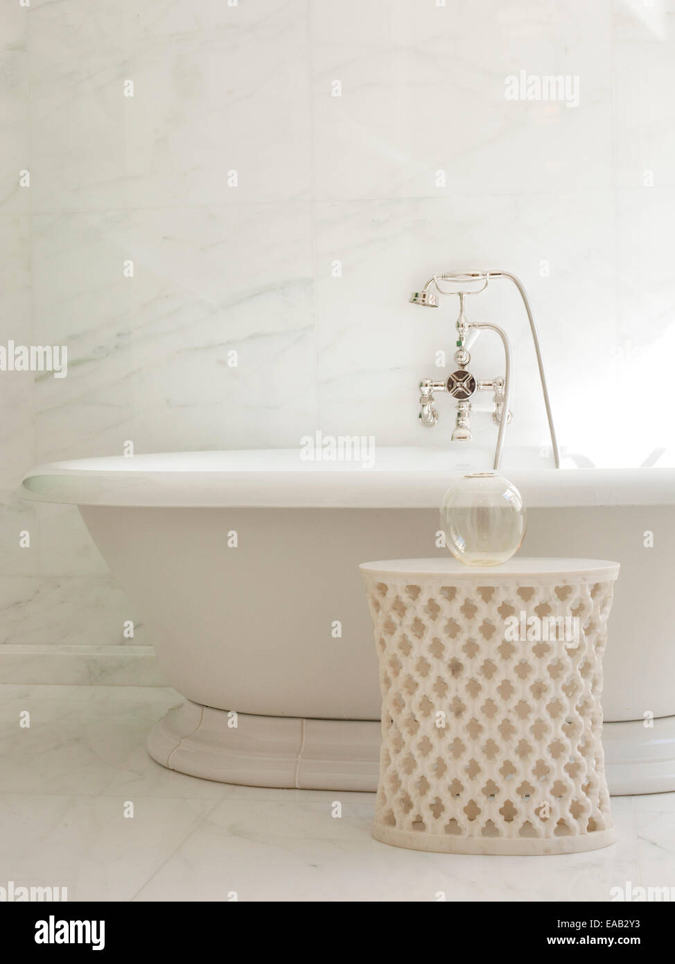 detail of marble bathtub and faucet Stock Photo