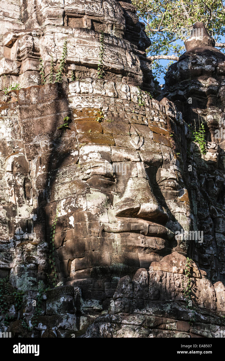 Cambodia.  North Gate, Angkor Thom.  Some say the face is that of King Jayavarman VII, but this is not universally accepted. Stock Photo