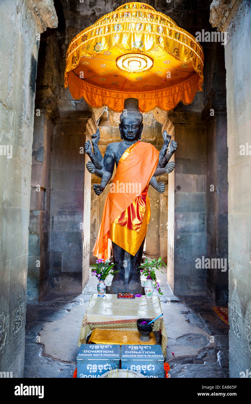 Cambodia, Angkor Wat.  Vishnu Statue inside the Entrance to the temple. Stock Photo