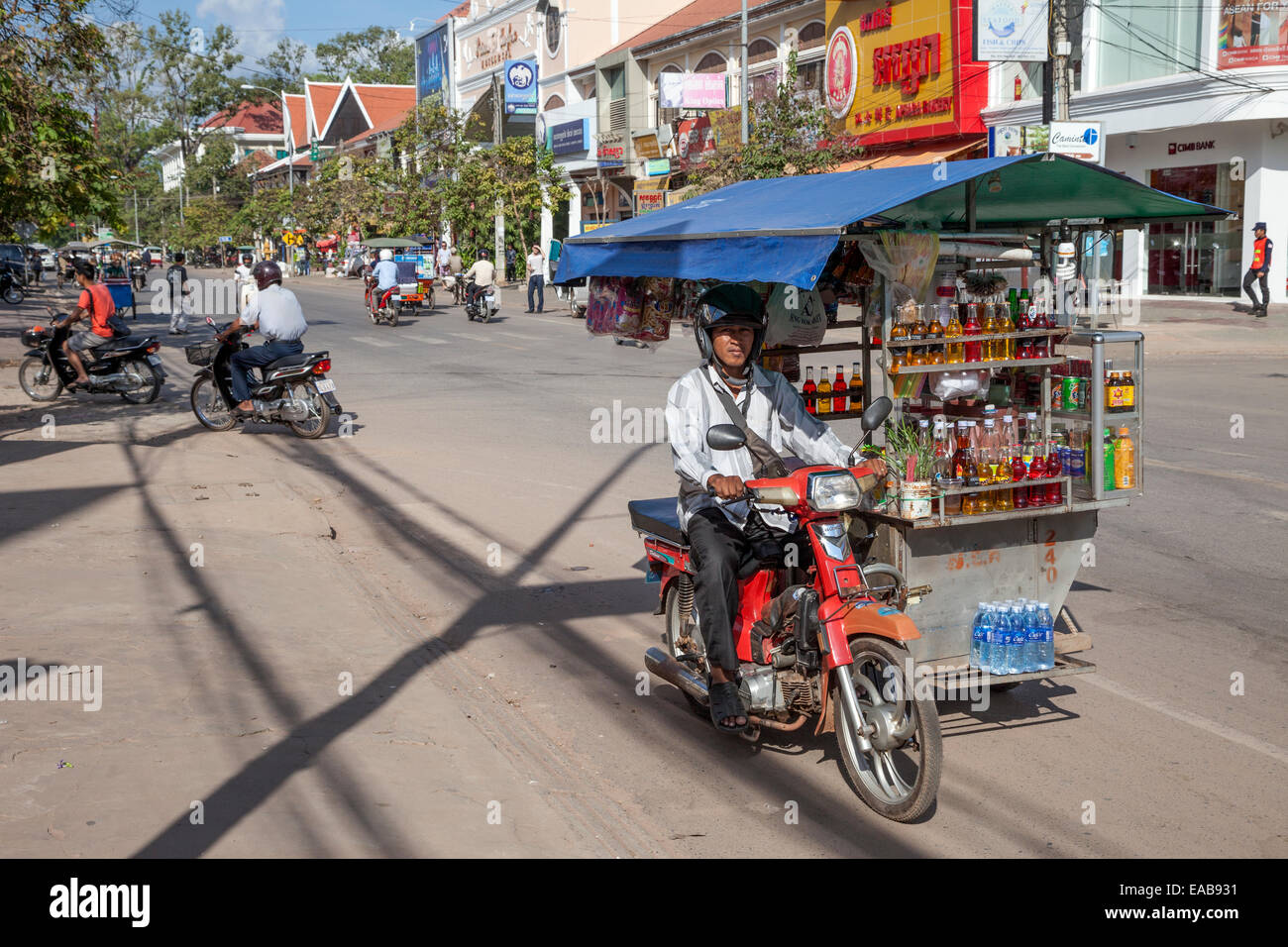 Cambodia, Siem Reap Street Scene.  Motorized Soft-drink Vendor. Stock Photo