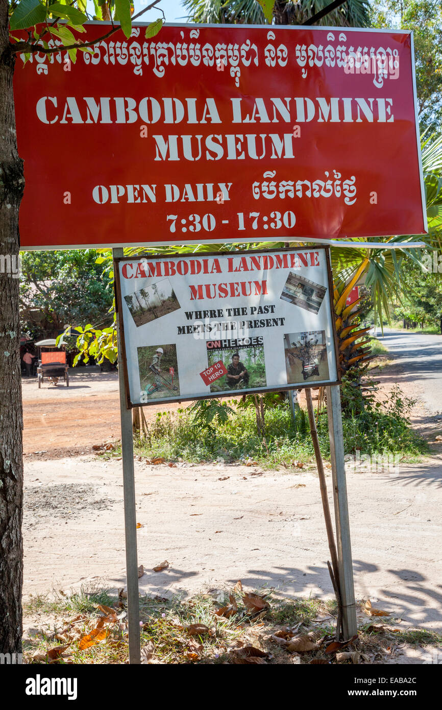 Cambodia.  Landmine Museum Sign, also Showing Name in Khmer Alphabet. Stock Photo