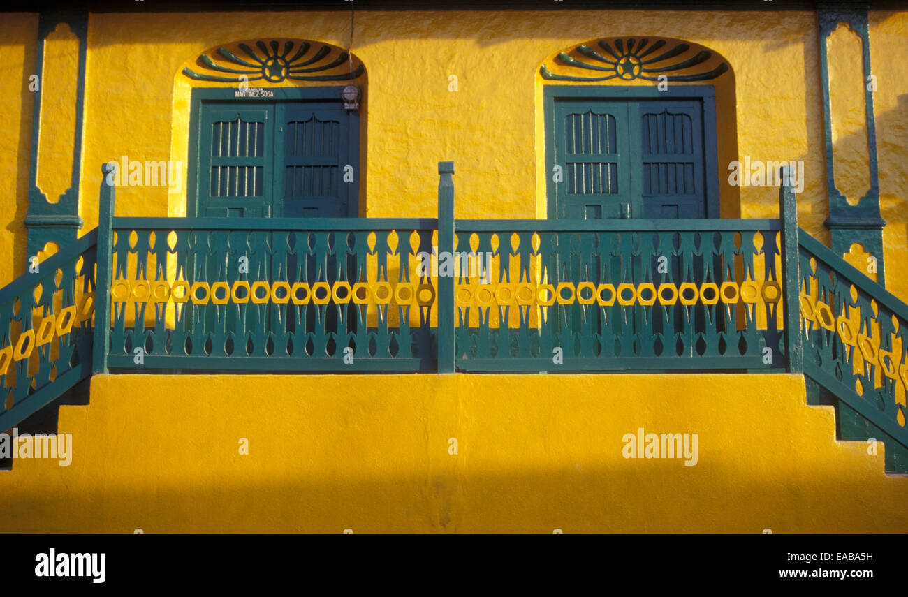 Colourful restored house on the island of Flores, El Peten, Guatemala