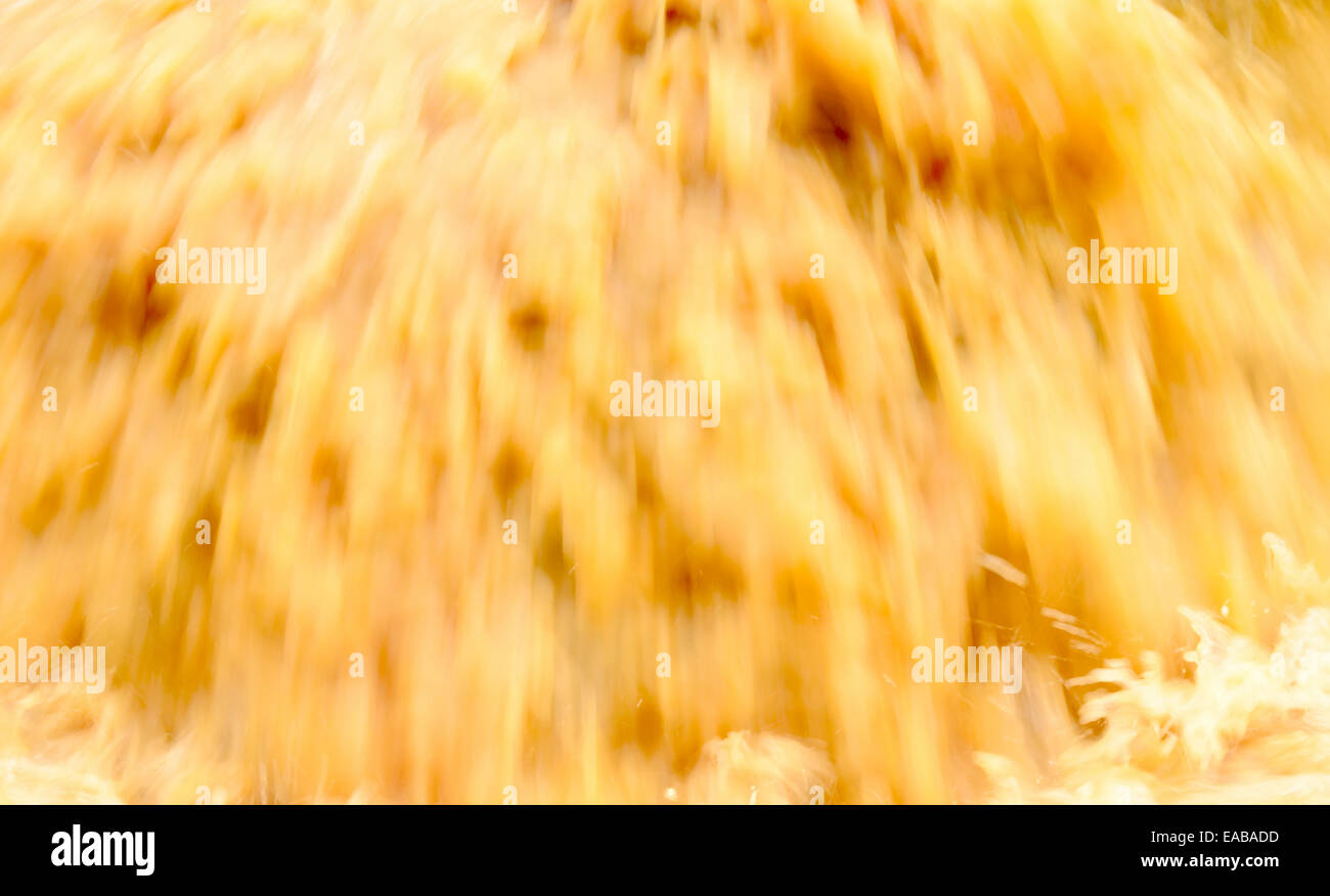 The Motion Blur of Dirty Water Stream. Stock Photo