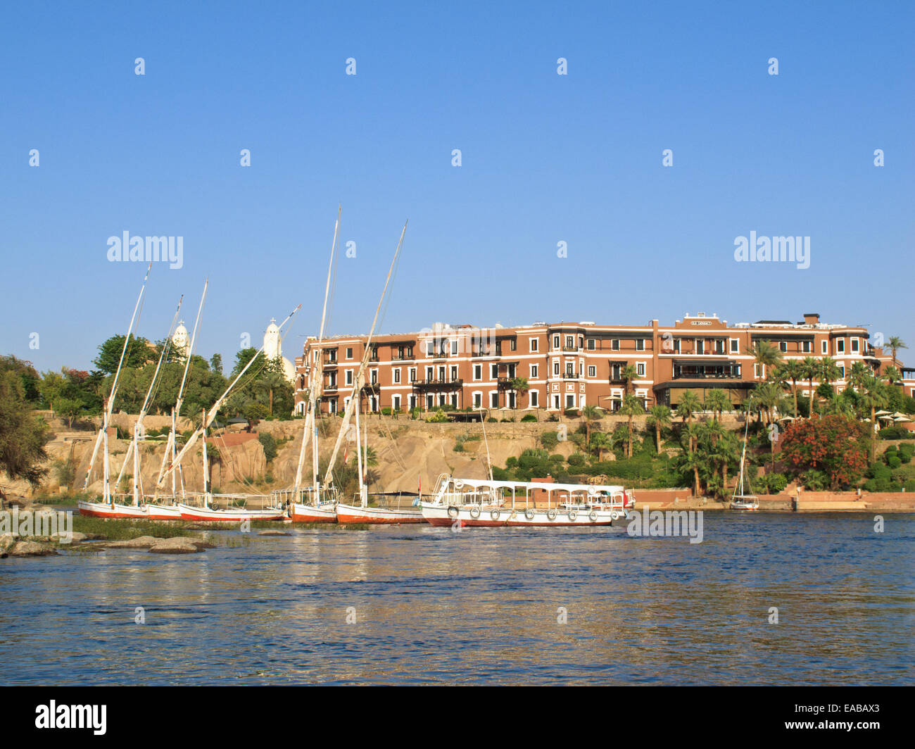The legendary Old Cataract at the bank of Nile River, Aswan Stock Photo