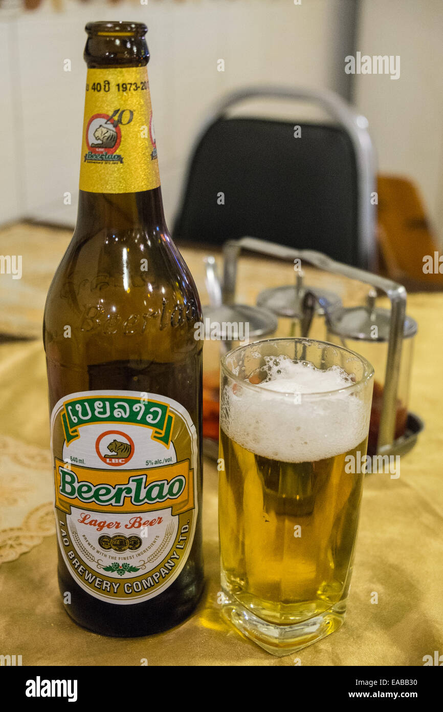 Beer Lao,bottle and glass in restaurant in Vientiane, capital of Laos, South East Asia, Asia, Stock Photo