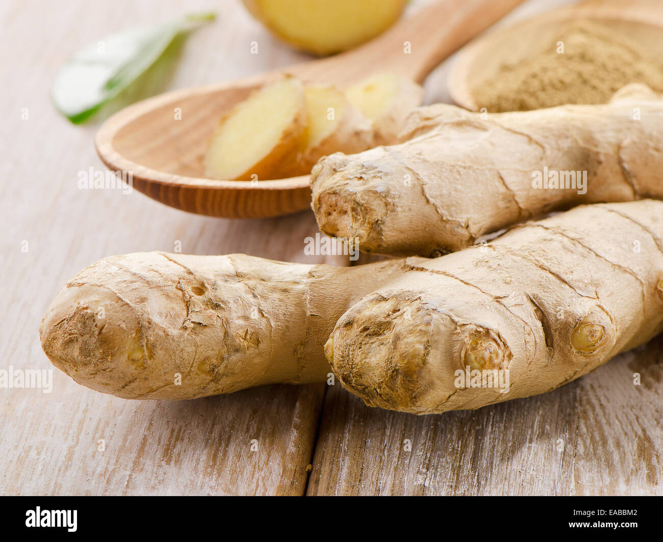 Ginger on a wooden table. Selective focus Stock Photo - Alamy