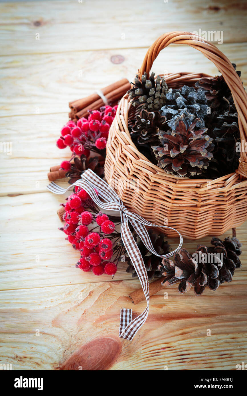 cones in baskets and other christmas decorations on boards Stock Photo ...