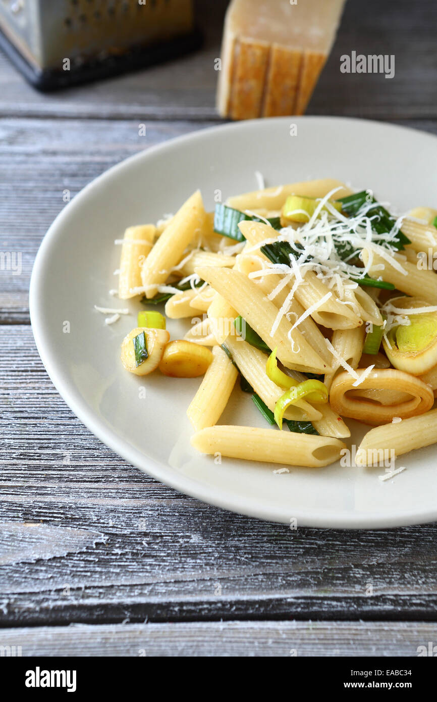 Pasta with cheese and onions, delicious food Stock Photo