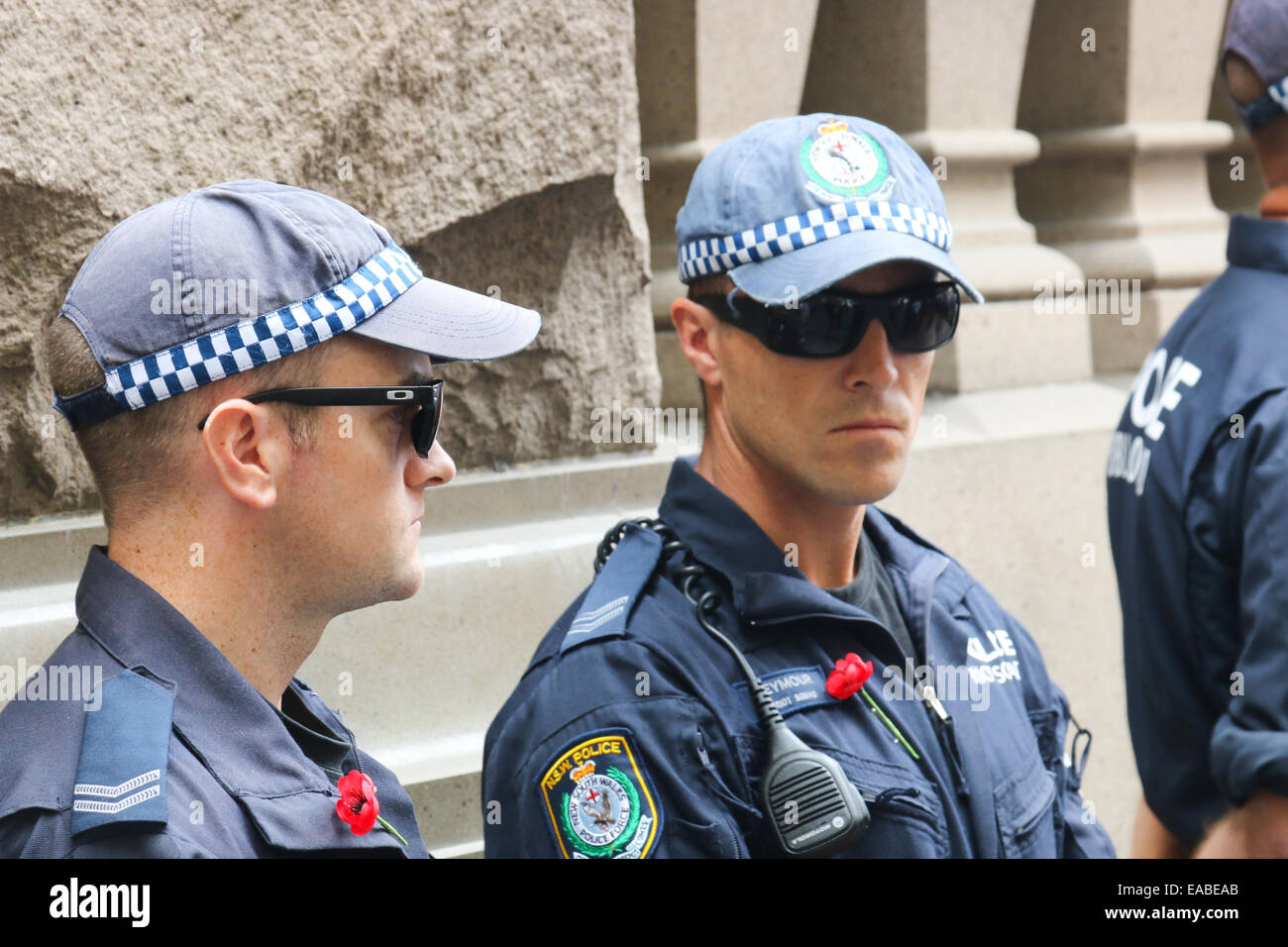 Sydney, Australia. 11th Nov, 2014. Australia celebrates Remembrance Day in Martin Place Sydney. Commonwealth and State politicians attended, as did the Governor of New South Wales and many ex servicemen. Tight security was in place at the event with NSW Police officers on patrol Credit:  martin berry/Alamy Live News Stock Photo