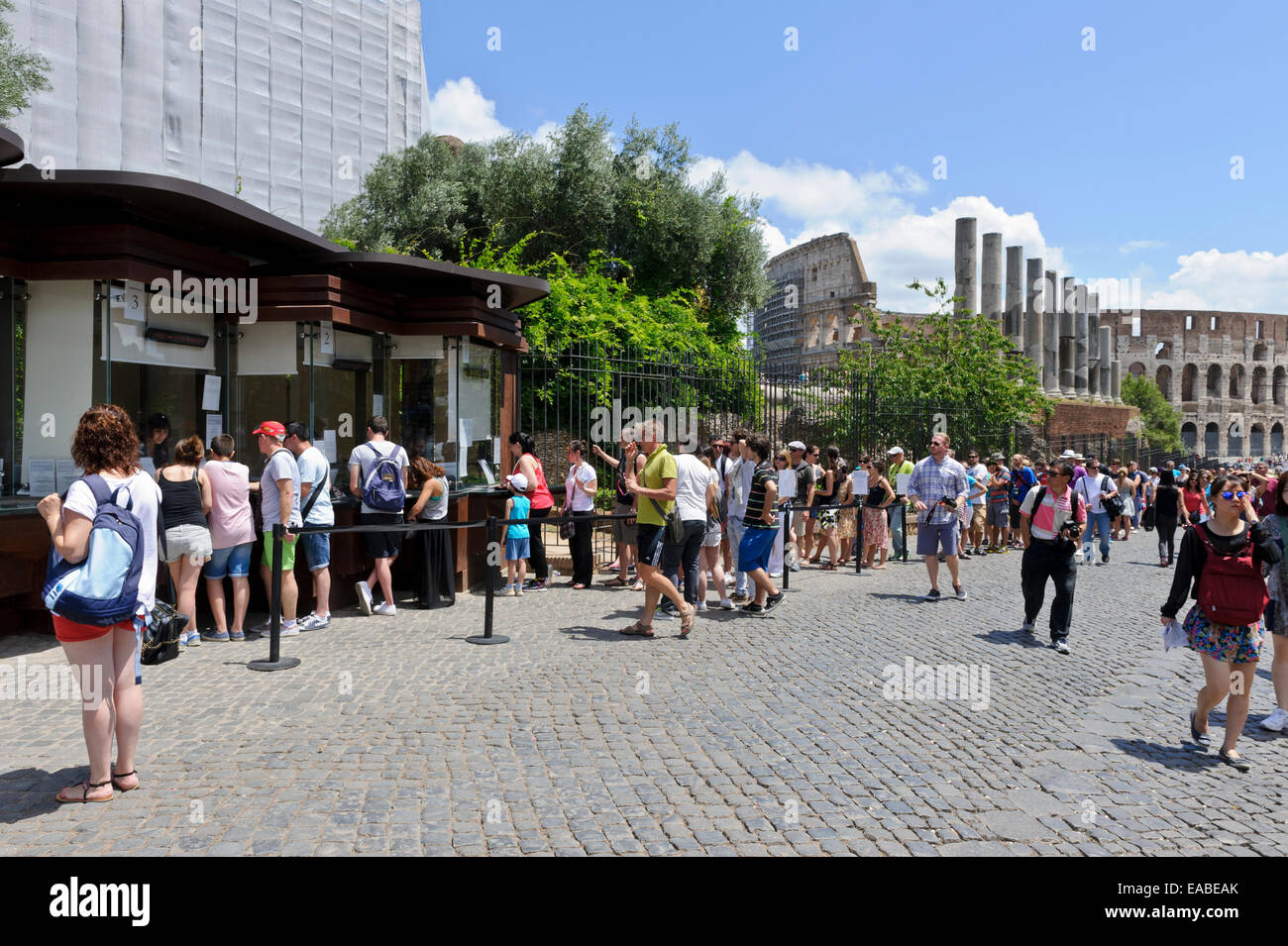 Tourists queuing to buy tickets for the Roman Forum attraction in the City of Rome, Italy. Stock Photo