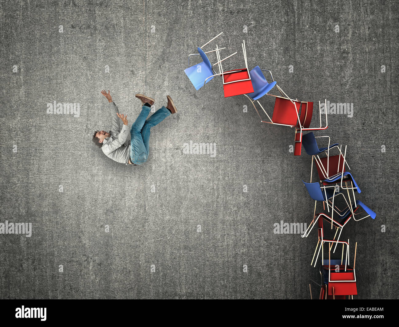 man fall from chair pile Stock Photo