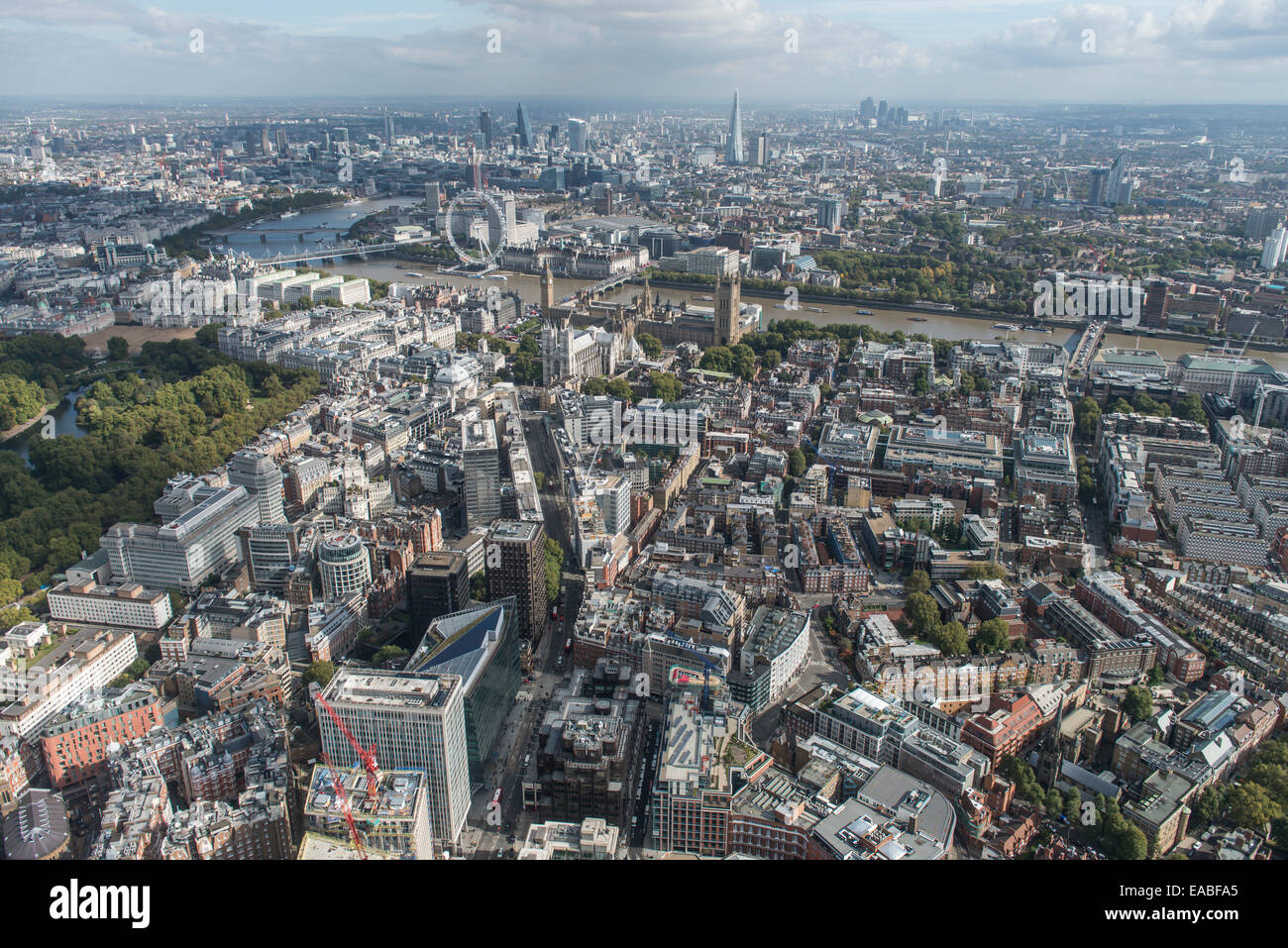 An aerial view looking from Westminster with the Houses of Parliament, London Eye and City visible in the background. Stock Photo