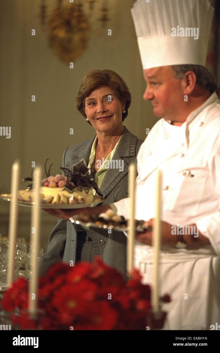 First Lady Laura Bush and White House Pastry Chef Roland Mesnier Participate in the Press Preview for the State Dinner for Stock Photo