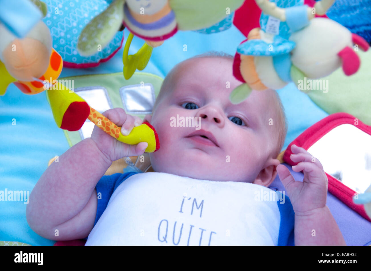 Baby Playing On Mat With Gym Mobile Above Stock Photo 75242918