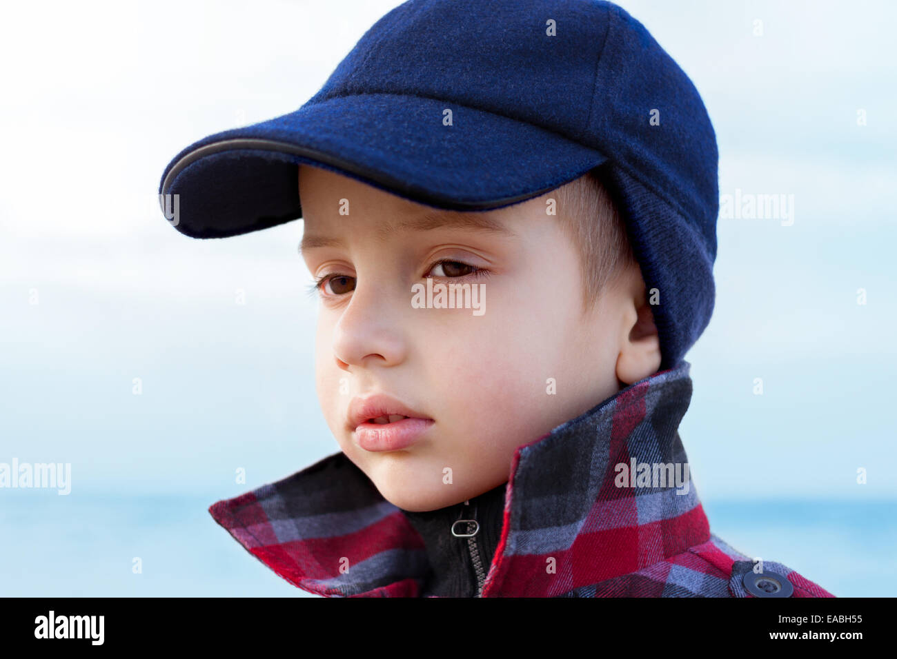 child boy close up fashion portrait upturned collar outdoor Stock Photo