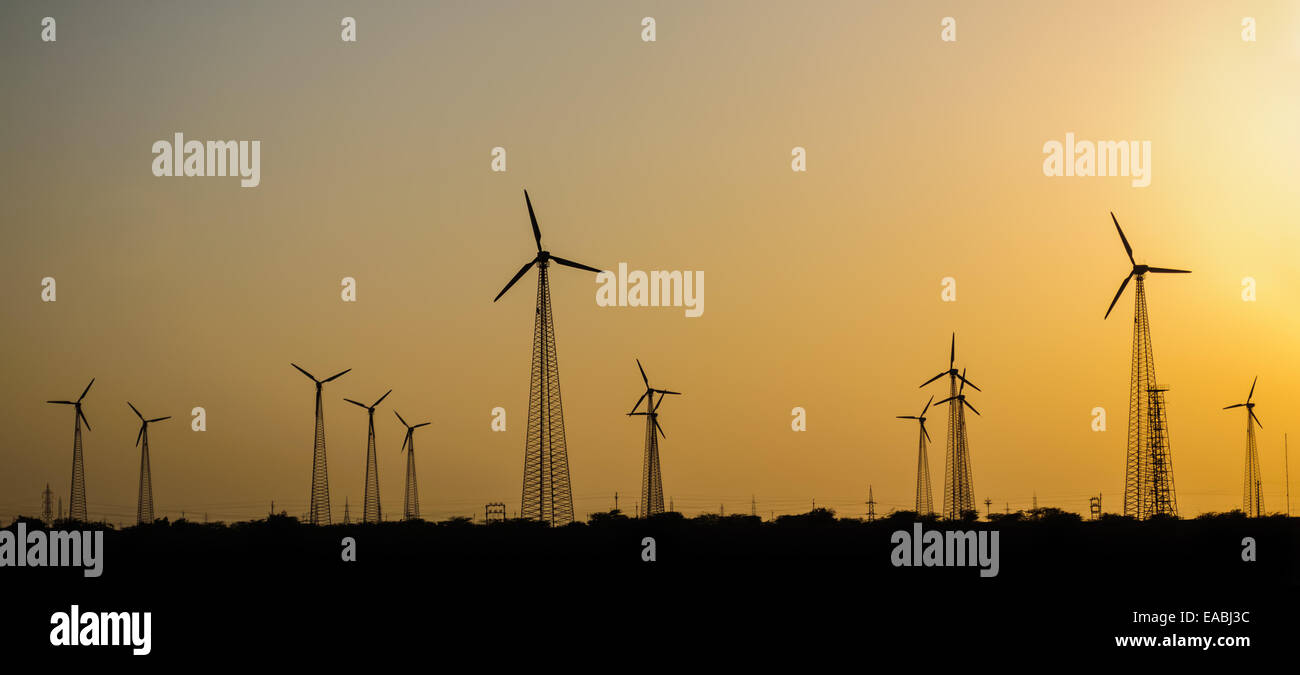 Electricity generating windmills in Indian Thar desert harvesting wind energy Stock Photo