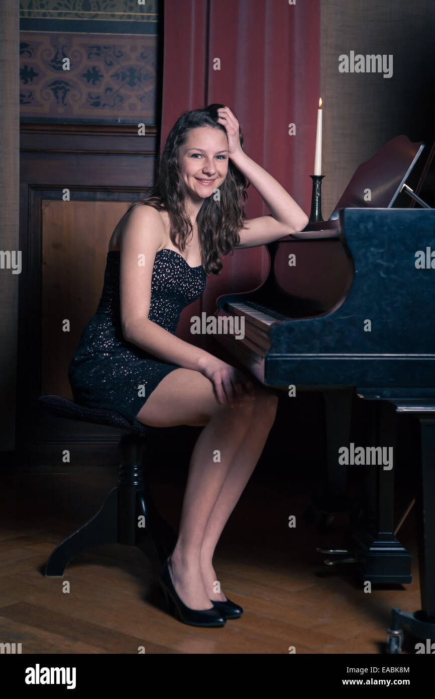 indoor-portrait-of-a-young-female-piano-player-stock-photo-alamy