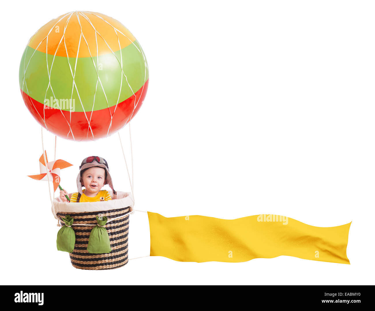cheerful child girl on hot air balloon isolated on white Stock Photo