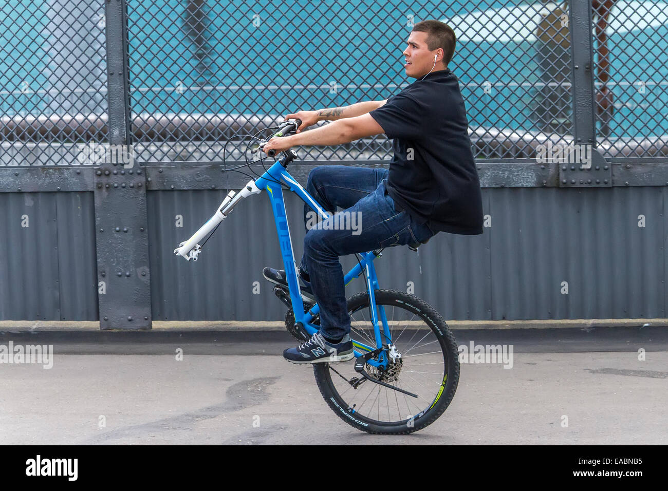 Riding A Bike With One Wheel Copenhagen Denmark Stock Photo